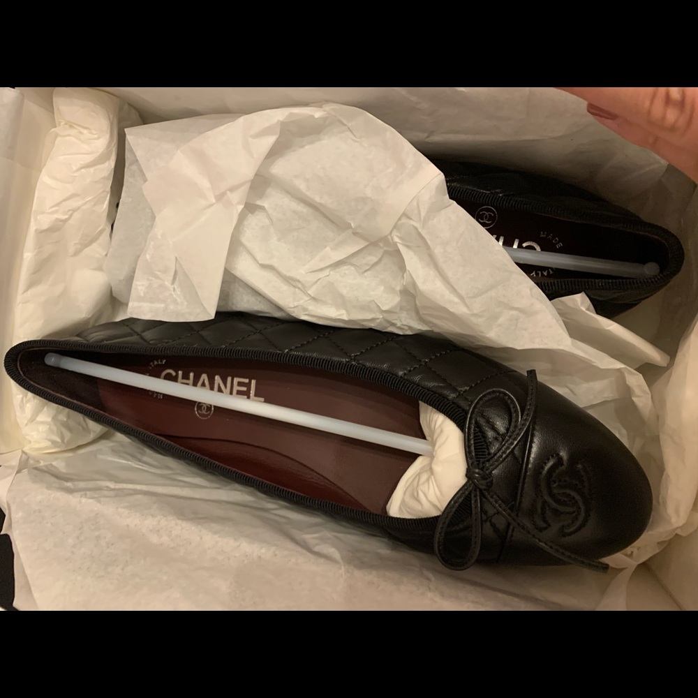 Black Chanel flats, never worn!